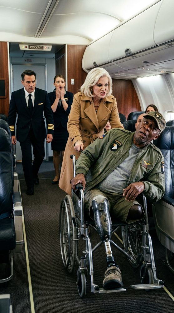 Woman_pushes_veteran's_wheelchair_202605122145